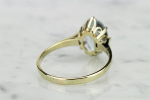 VINTAGE ESTATE AQUAMARINE RING ON 9ct YELLOW GOLD