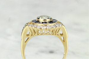 MODERN AQUAMARINE SAPPHIRE AND DIAMOND TARGET RING ON 9ct YELLOW GOLD