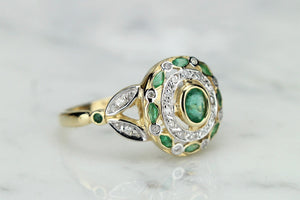 MODERN ART NOUVEAU STYLE EMERALD AND DIAMOND RING ON 9ct YELLOW GOLD