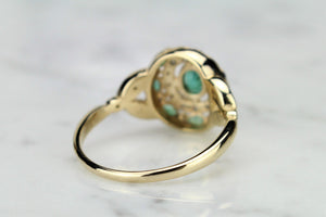 MODERN ART NOUVEAU STYLE EMERALD AND DIAMOND RING ON 9ct YELLOW GOLD