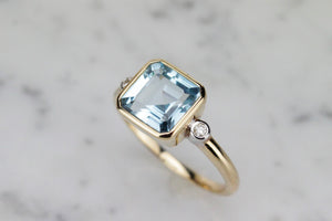 MODERN 3.6ct TOPAZ & DIAMOND RING ON 9ct YELLOW GOLD