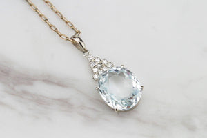 VINTAGE ESTATE BLUE TOPAZ & DIAMOND PENDANT ON 9ct WHITE GOLD