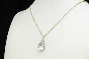 VINTAGE ESTATE BLUE TOPAZ & DIAMOND PENDANT ON 9ct WHITE GOLD