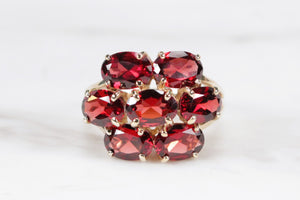 MODERN ESTATE PYROPE GARNET CLUSTER RING ON 9ct YELLOW GOLD