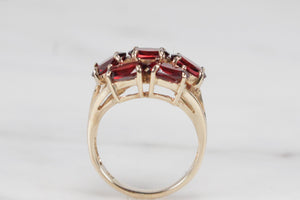 MODERN ESTATE PYROPE GARNET CLUSTER RING ON 9ct YELLOW GOLD