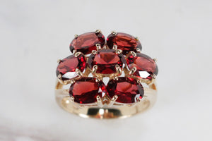 MODERN ESTATE PYROPE GARNET CLUSTER RING ON 9ct YELLOW GOLD