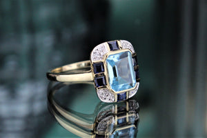 MODERN ART DECO STYLE TOPAZ, SAPPHIRE & DIAMOND RING ON 9ct YELLOW GOLD