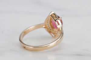 MODERN PINK TOURMALINE & DIAMOND HALO RING ON 14CT YELLOW & WHITE GOLD