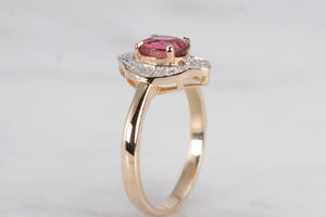 MODERN PINK TOURMALINE & DIAMOND HALO RING ON 14CT YELLOW & WHITE GOLD