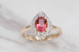 MODERN PINK TOURMALINE & DIAMOND HALO RING ON 14CT YELLOW & WHITE GOLD