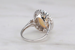 MODERN SOLID WHITE OPAL & DIAMOND HALO RING ON 9ct WHITE GOLD