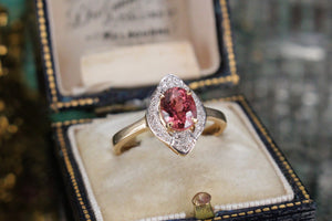 MODERN PINK TOURMALINE & DIAMOND HALO RING ON 14CT YELLOW & WHITE GOLD