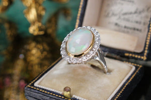 MODERN SOLID WHITE OPAL & DIAMOND HALO RING ON 9ct WHITE GOLD