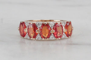 MODERN ORANGE SAPPHIRE & DIAMOND HALF-HOOP RING ON 14ct YELLOW GOLD