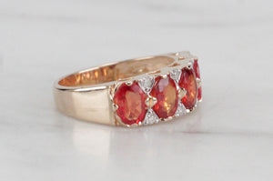 MODERN ORANGE SAPPHIRE & DIAMOND HALF-HOOP RING ON 14ct YELLOW GOLD