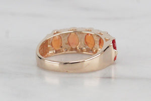 MODERN ORANGE SAPPHIRE & DIAMOND HALF-HOOP RING ON 14ct YELLOW GOLD