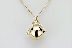 MODERN ESTATE BALL SPINNER PENDANT AND CHAIN ON 9ct YELLOW GOLD