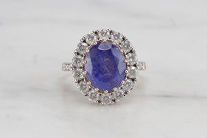 MODERN 4.09ct TANZANITE & DIAMOND HALO RING ON 14ct YELLOW & WHITE GOLD