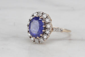 MODERN 4.09ct TANZANITE & DIAMOND HALO RING ON 14ct YELLOW & WHITE GOLD