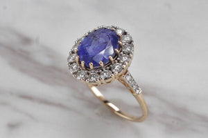 MODERN 4.09ct TANZANITE & DIAMOND HALO RING ON 14ct YELLOW & WHITE GOLD