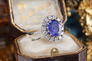 MODERN 4.09ct TANZANITE & DIAMOND HALO RING ON 14ct YELLOW & WHITE GOLD