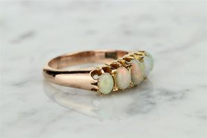 ANTIQUE EDWARDIAN OPAL HALF-HOOP RING ON 9ct ROSE GOLD