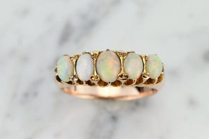 ANTIQUE EDWARDIAN OPAL HALF-HOOP RING ON 9ct ROSE GOLD