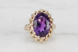 VINTAGE MID CENTURY 10.7ct AMETHYST COCKTAIL RING ON 9ct YELLOW GOLD