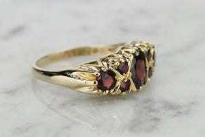 VINTAGE ESTATE GARNET BRIDGE RING ON 9ct YELLOW GOLD