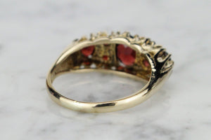 VINTAGE ESTATE GARNET BRIDGE RING ON 9ct YELLOW GOLD