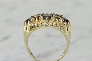 VINTAGE ESTATE GARNET BRIDGE RING ON 9ct YELLOW GOLD