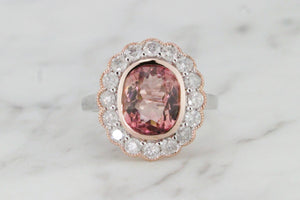 MODERN 3.11ct PINK TOURMALINE & DIAMOND HALO RING ON 14ct ROSE & WHITE GOLD