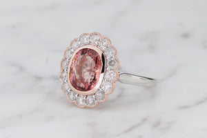 MODERN 3.11ct PINK TOURMALINE & DIAMOND HALO RING ON 14ct ROSE & WHITE GOLD