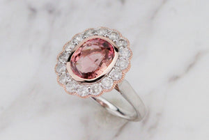 MODERN 3.11ct PINK TOURMALINE & DIAMOND HALO RING ON 14ct ROSE & WHITE GOLD