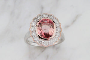 MODERN 3.11ct PINK TOURMALINE & DIAMOND HALO RING ON 14ct ROSE & WHITE GOLD