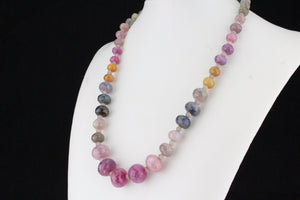 MODERN FACETED NATURAL MULTI COLOUR GRADUATED SAPPHIRE NECKLACE ON 9ct YELLOW GOLD