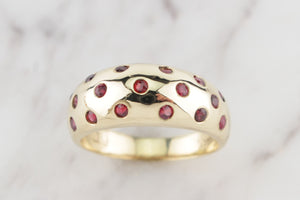 R&V BESPOKE RUBY BOMBE RING ON 14ct YELLOW GOLD