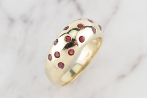 R&V BESPOKE RUBY BOMBE RING ON 14ct YELLOW GOLD