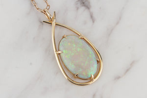 MID CENTURY SOLID WHITE OPAL PENDANT ON 10ct YELLOW GOLD