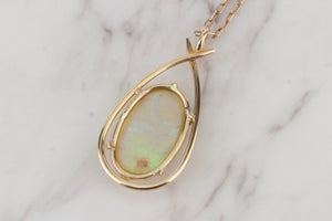 MID CENTURY SOLID WHITE OPAL PENDANT ON 10ct YELLOW GOLD