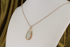 MID CENTURY SOLID WHITE OPAL PENDANT ON 10ct YELLOW GOLD