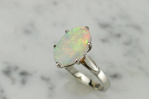 VINTAGE SOLID WHITE OPAL RING ON 18ct WHITE GOLD